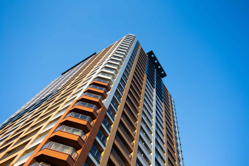 office-building-exterior-on-blue-sky-background-SBI-301090724-min California Business Consulting Services
